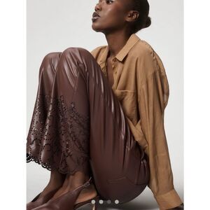 Anthropologie Laser Cut Faux Leather Novelty Slim Flare Pants Burgundy 8 NWT